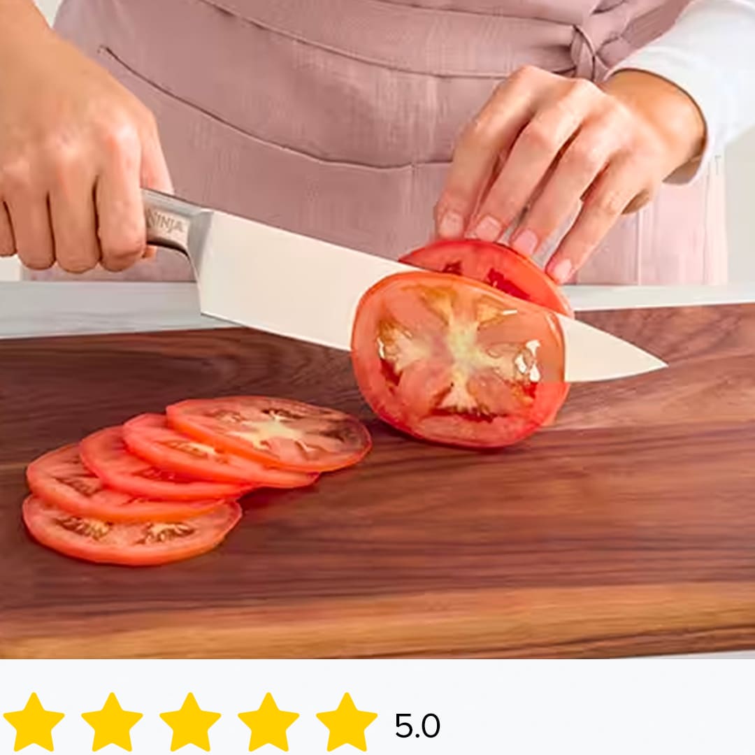 Ninja® knife cutting thin slices of tomato
