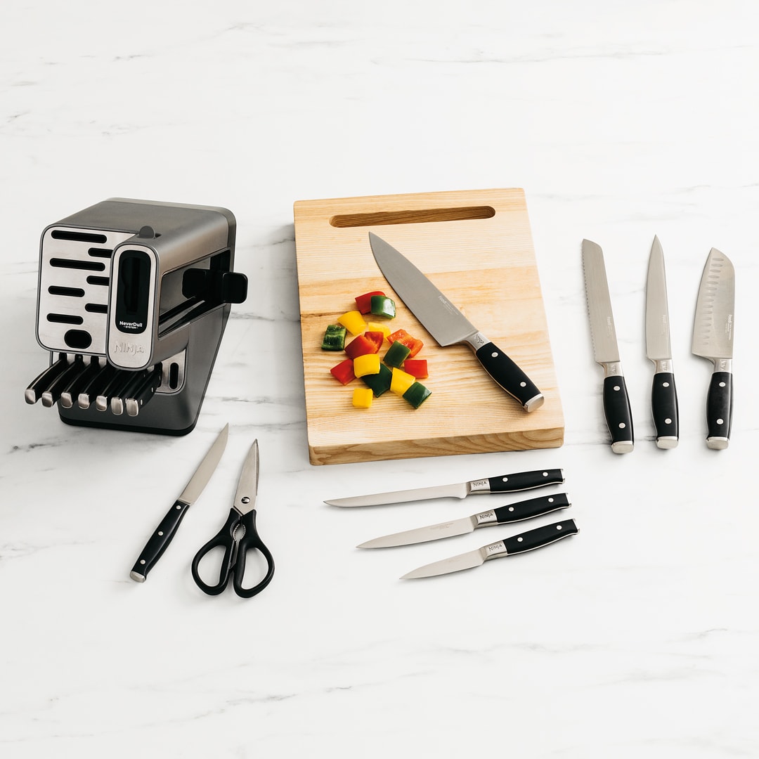 premium knife set with chopped peppers
